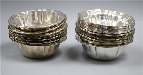 A set of six Italian 800 white metal petal rimmed deep bowls and a set of twelve similar plated bowls, 20 oz.